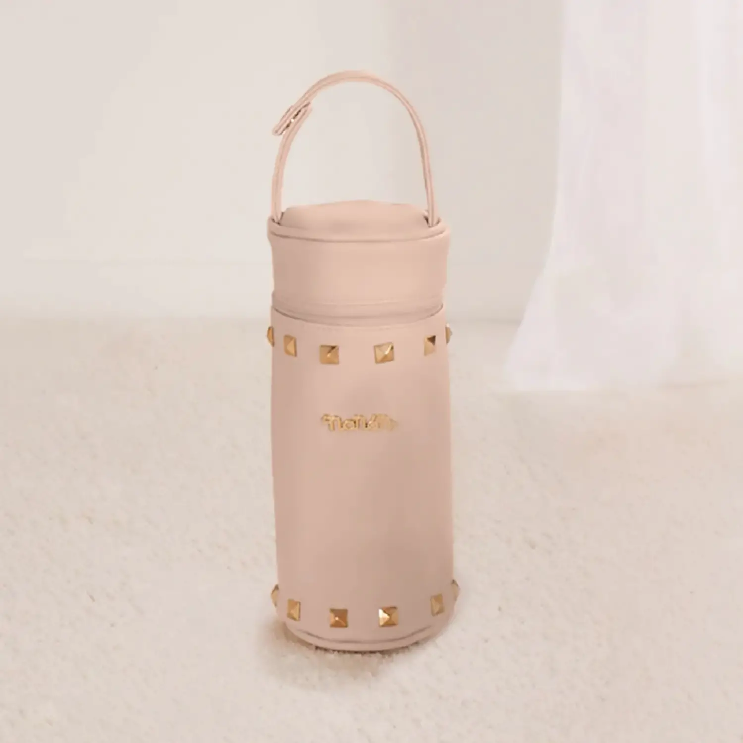 nanan-portabiberon-colette-borchiato-rosa-in-ecopelle PORTABIBERON CON BORCHIE NANAN ROSA - immagine 1